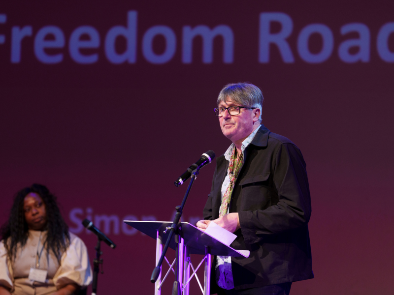 Poet Laureate, Simon Armitage, delivers the first reading of his original poem, ‘Freedom Road’, at the ‘Our Freedom: Then and Now’ launch event, led by Future Arts Centres, at Contact Theatre in Manchester.