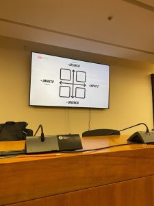 A projection screen showing a slide during a workshop