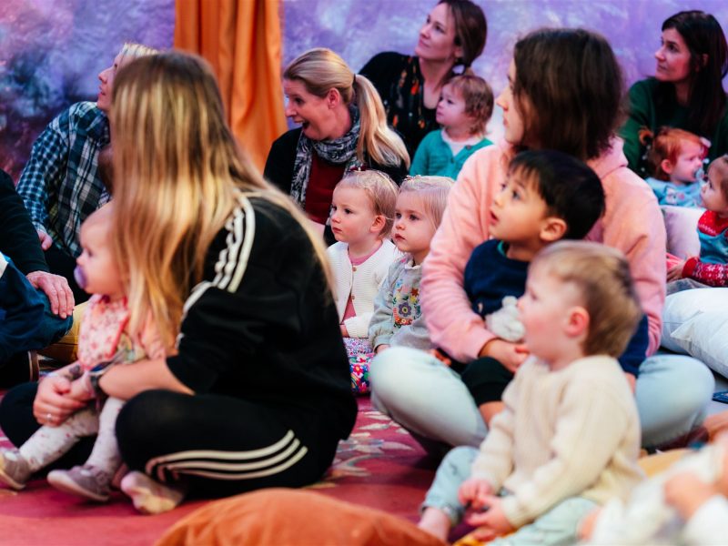 An audiences of young families watching Timothy The Yeti at The Point